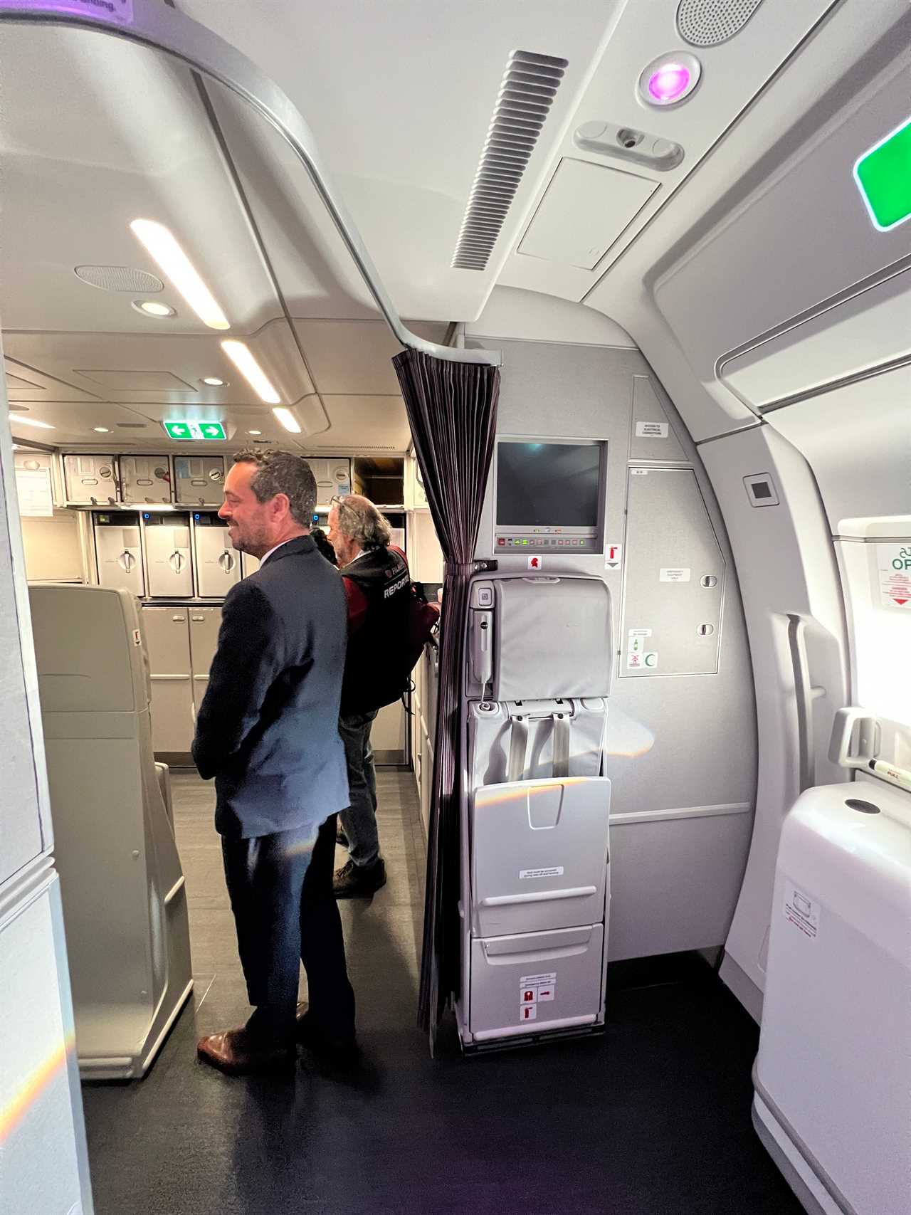 A wider shot of both the galley and the Airbus A350's rear emergency exit