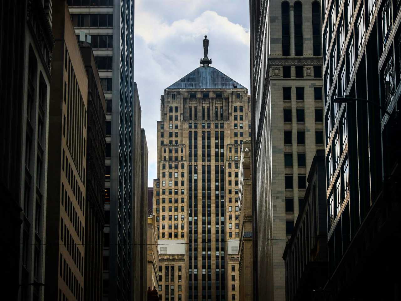 Board of Trade building in downtown Chicago surrounded by largely empty office buildings.