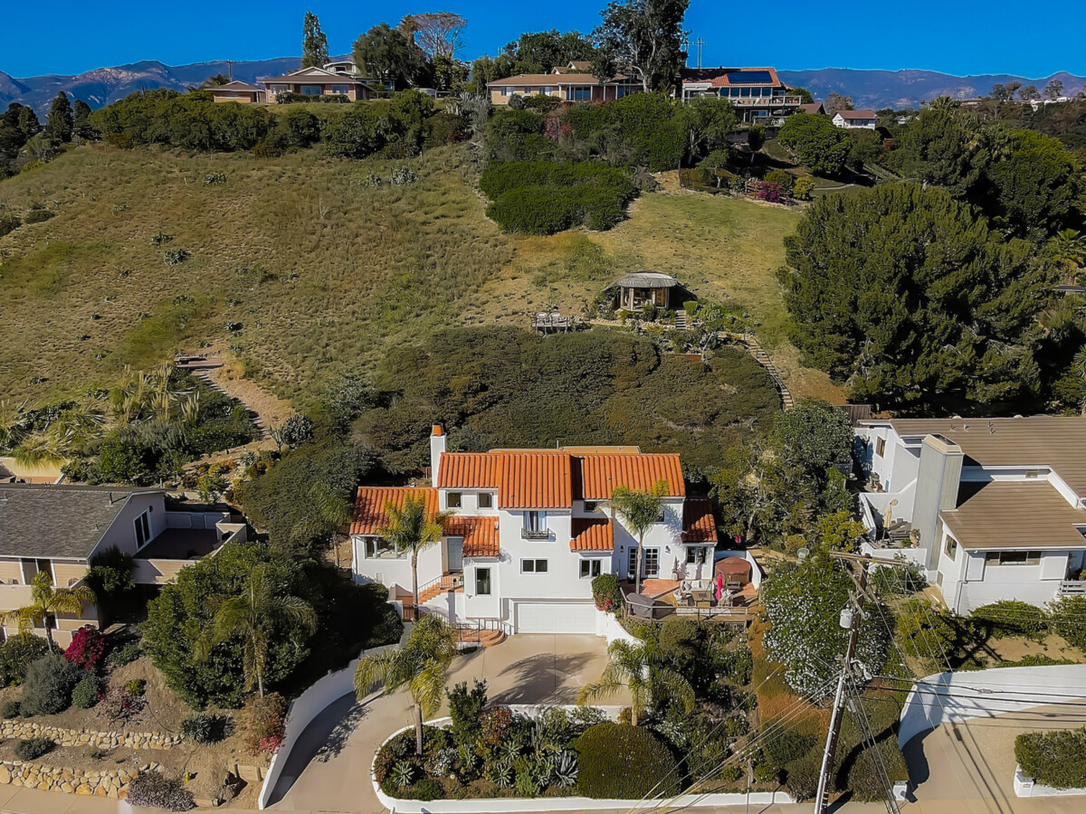 santa barbara home on a hill with greenery