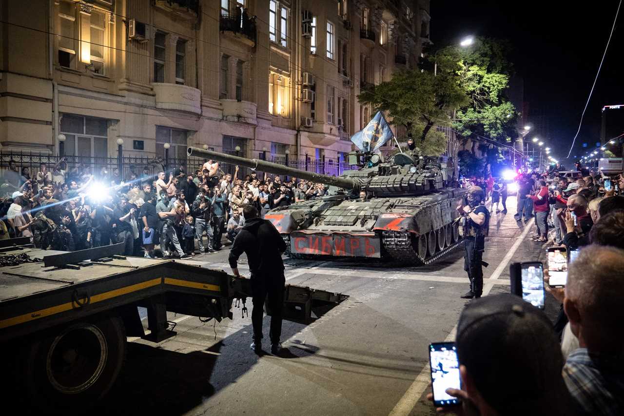 Members of Wagner group prepare to pull out from the headquarters of the Southern Military District to return to their base in Rostov-on-Don late on June 24, 2023.