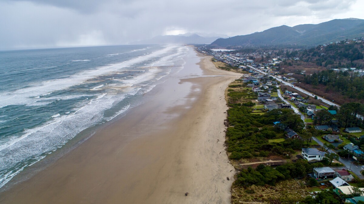 aerial view of beach and homes in rockaway beach