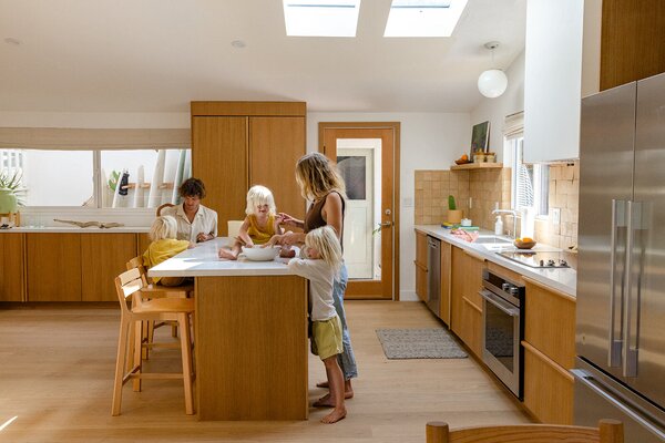 The kitchen’s large island is the heart of the home, bringing guests and family together. 