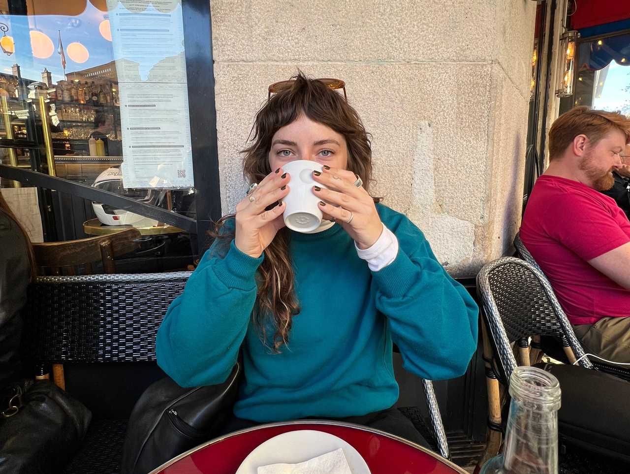 Madison Taylor drinking coffee