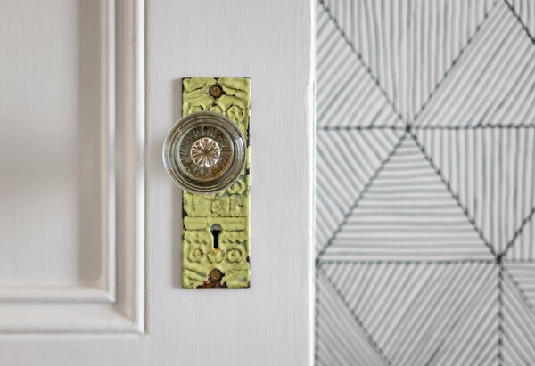 Old doors and mismatched hardware from an old nunnery in Massachusetts carry stories from the past forward. 