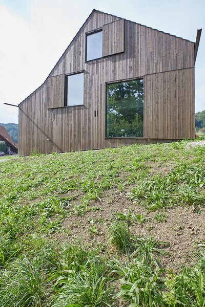 It Looks Like a Barn—But This Country Home in Switzerland Takes a Hard Turn Inside