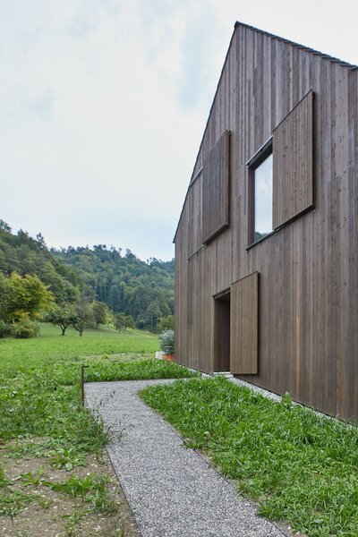 It Looks Like a Barn—But This Country Home in Switzerland Takes a Hard Turn Inside