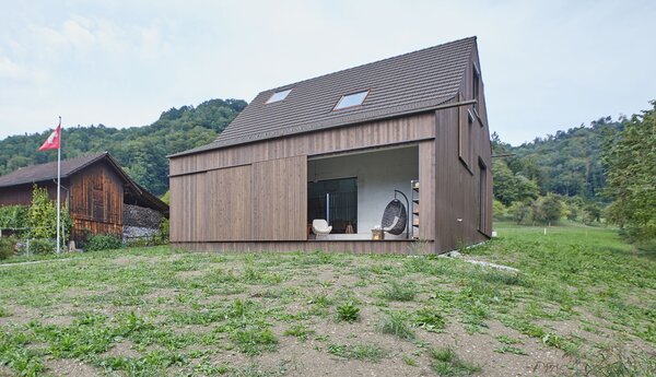 It Looks Like a Barn—But This Country Home in Switzerland Takes a Hard Turn Inside