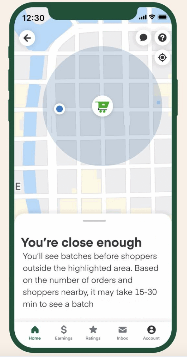 A screenshot of an Instacart worker's app shows part of a training for contractors. The user's position is shown via GPS on a map in relation to a store where they could pick an order. Around the store is a grey circle. Below the map, text tells shoppers that shoppers in the grey circle will "see batches before shoppers outside the highlighted area."