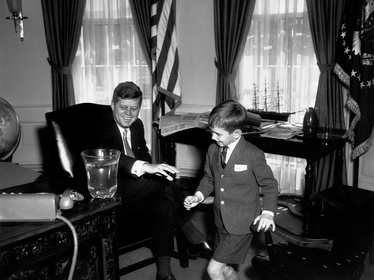 President Kennedy with his nephew, Robert F. Kennedy Jr., in the Oval Office.