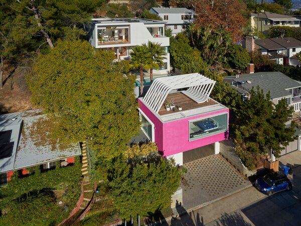 This L.A. Home Has a Yellow Crane That Relocates the Dining Table, Because Why Not?