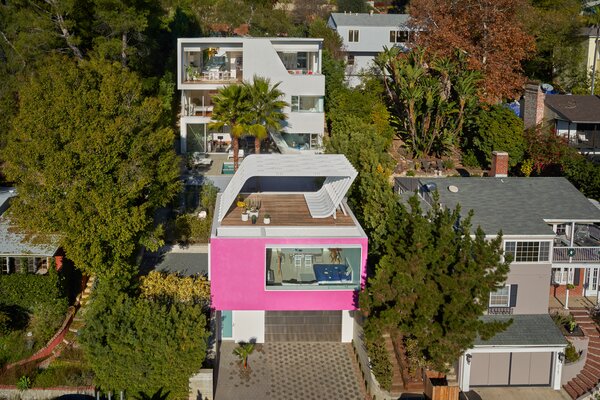 This L.A. Home Has a Yellow Crane That Relocates the Dining Table, Because Why Not?