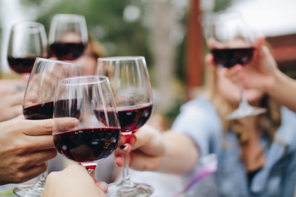 Friends cheersing with wine