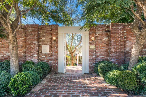 Now on the market for the first time in nearly 30 years, the meticulously maintained property sits behind more than 280' of hedged frontage, in the center of Brentwood.