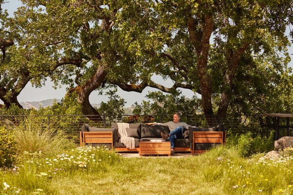 Christian Douglas, pictured here, chose Chicory furniture to align with his sustainable design vision.