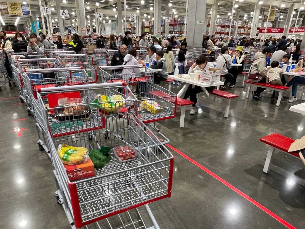 Shoppers were neatly putting all of their carts around the perimeter and it was making a barricade.