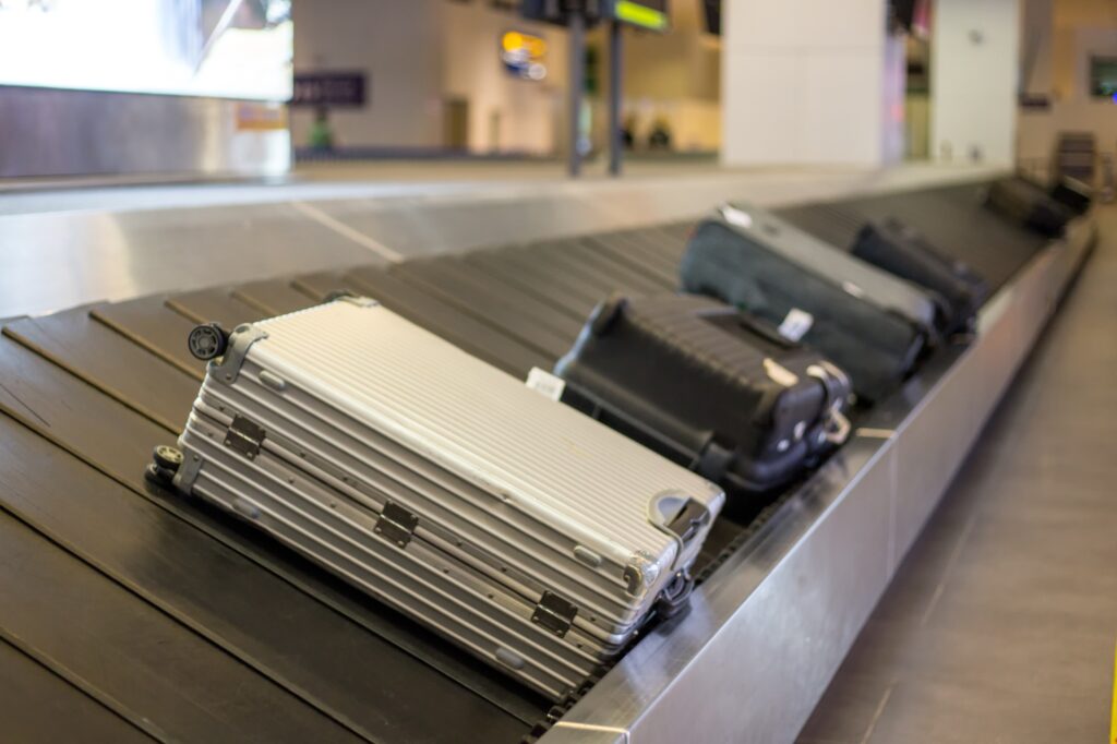 Luggage on the luggage carousel at an airport