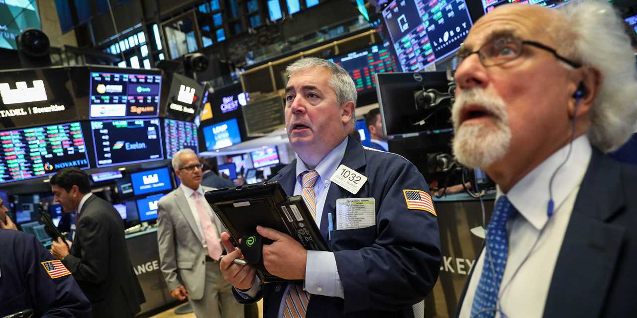 Stock traders on the exchange trading floor.