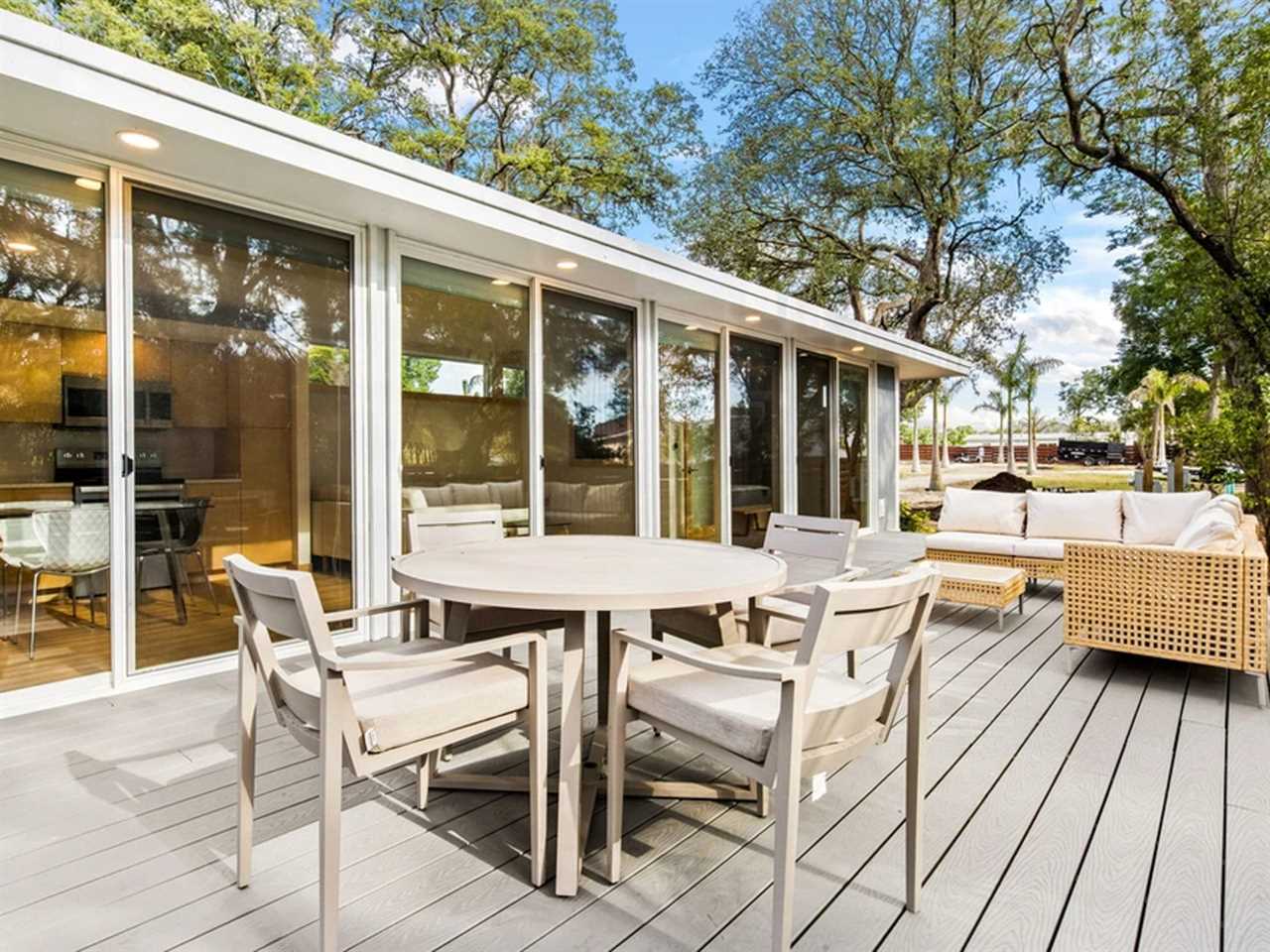 The back patio outside the N1 tiny home at Escape Tampa Bay's The Oaks