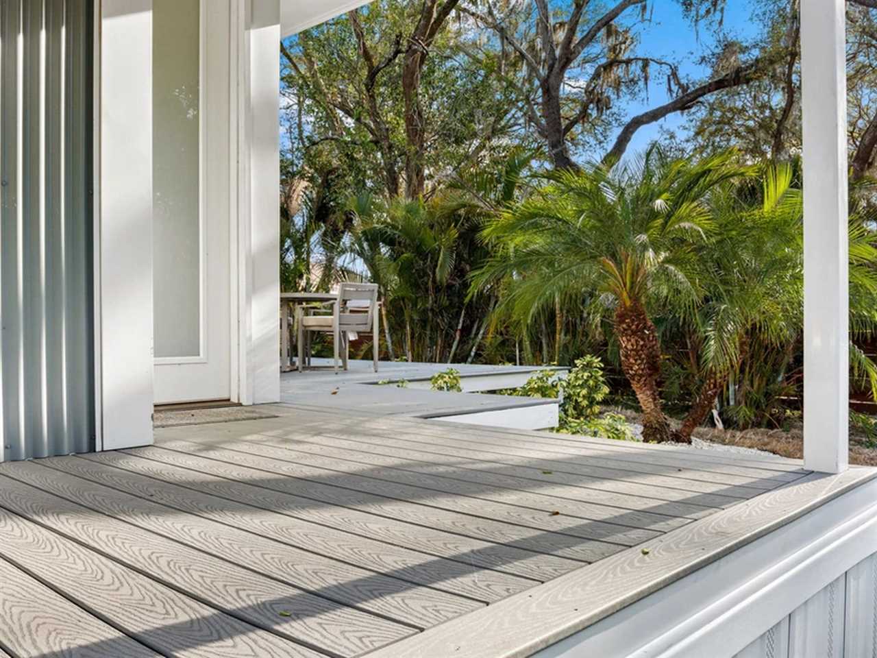 The front deck outsideThe bedroom inside the N1 tiny home at Escape Tampa Bay's The Oaks the N1 tiny home at Escape Tampa Bay's The Oaks