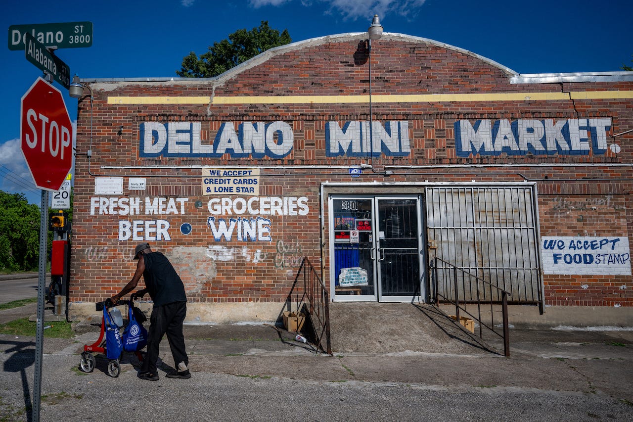 U.S. Veteran Bennie Earsle, 72, exits a store after buying a jug of water on June 10, 2022 in Houston, Texas.