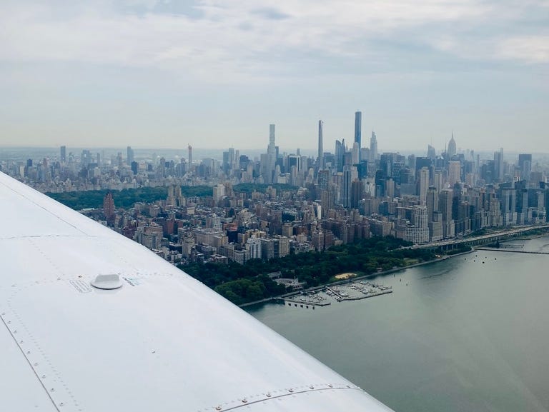 Flying along the New York City skyline.