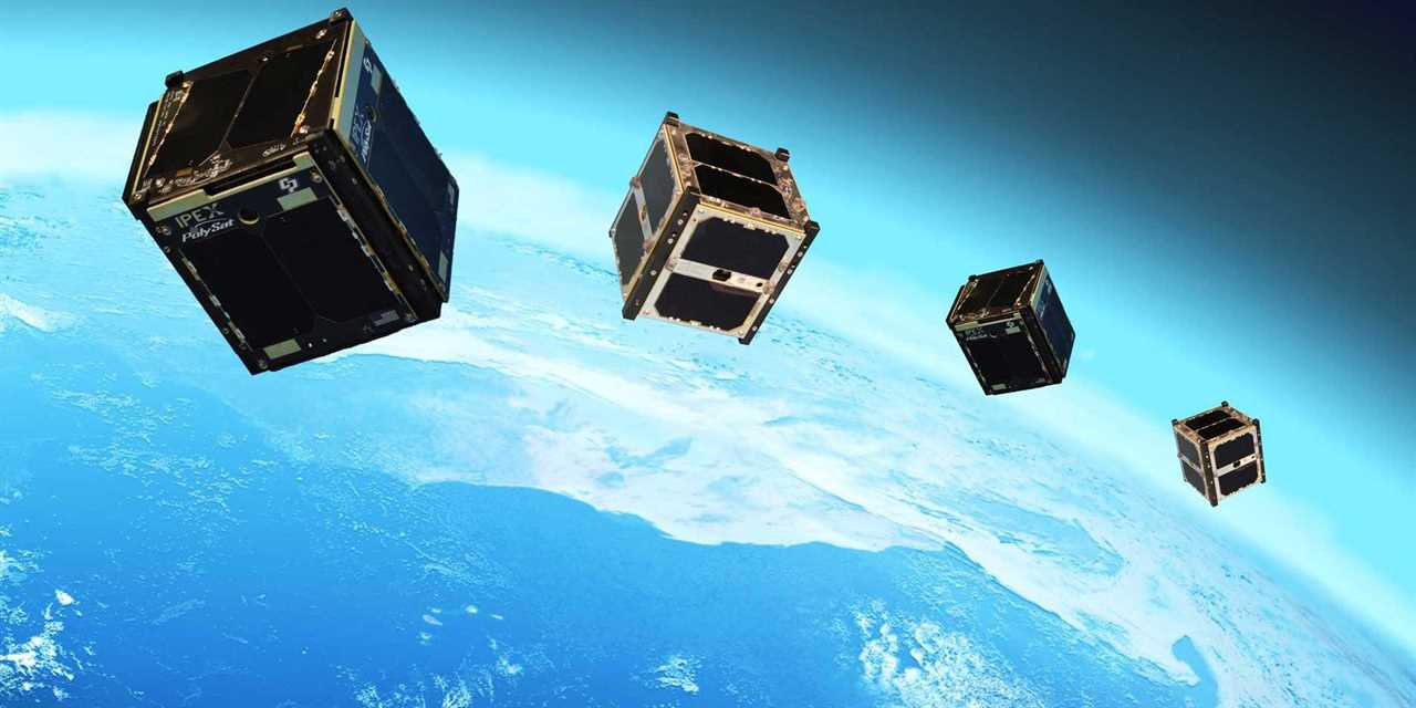 An Artist's impression of a CubeSat in space shows four boxes floating in Earth's orbit.