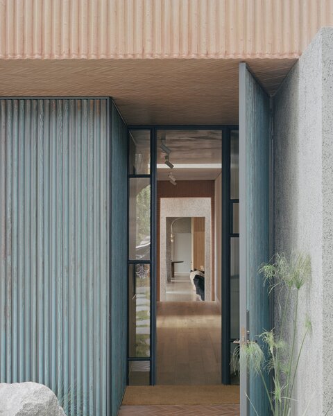 A Brick Facade Is About All This Australian Home Shares With Its Neighbors