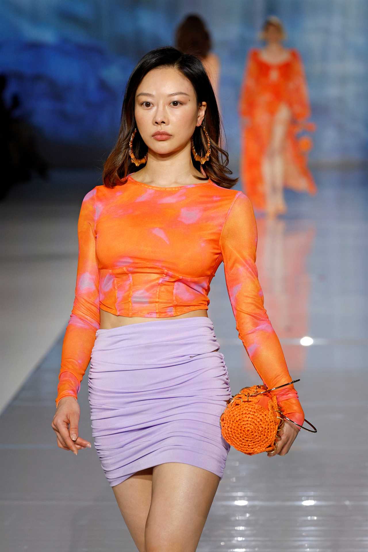 A model walks the runway during a Shein fashion show.