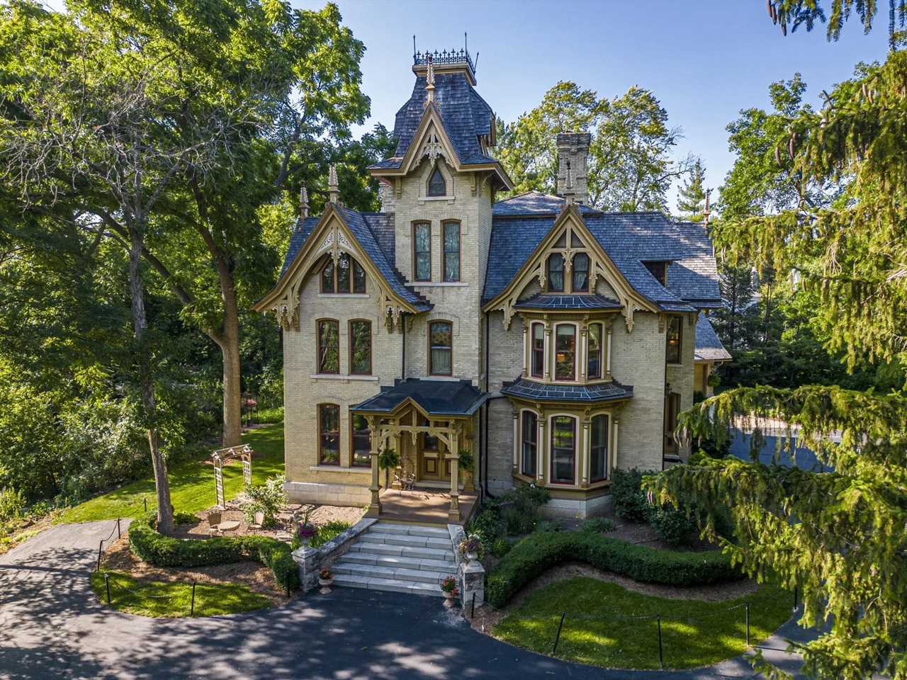 The front of a Victorian mansion.