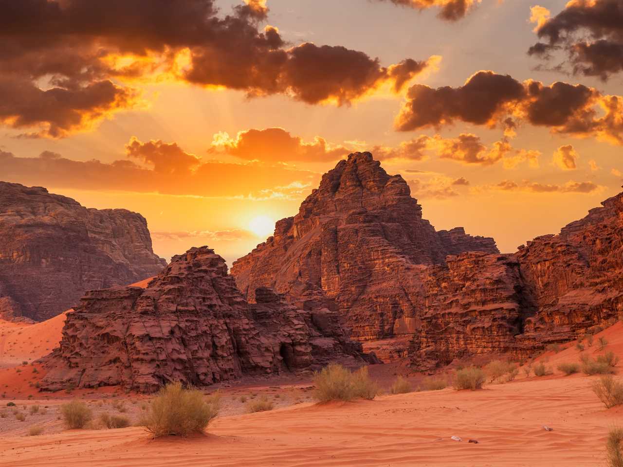 Rocks in Wadi Rum, Jordan desert at sunset.