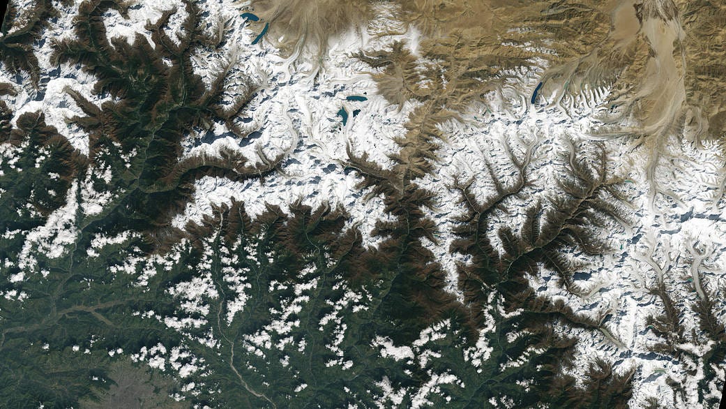 The city of Kathmandu, Nepal, seen at the bottom left of this Landsat 9 image, lies in a valley south of the Himalayan Mountains between Nepal and China.