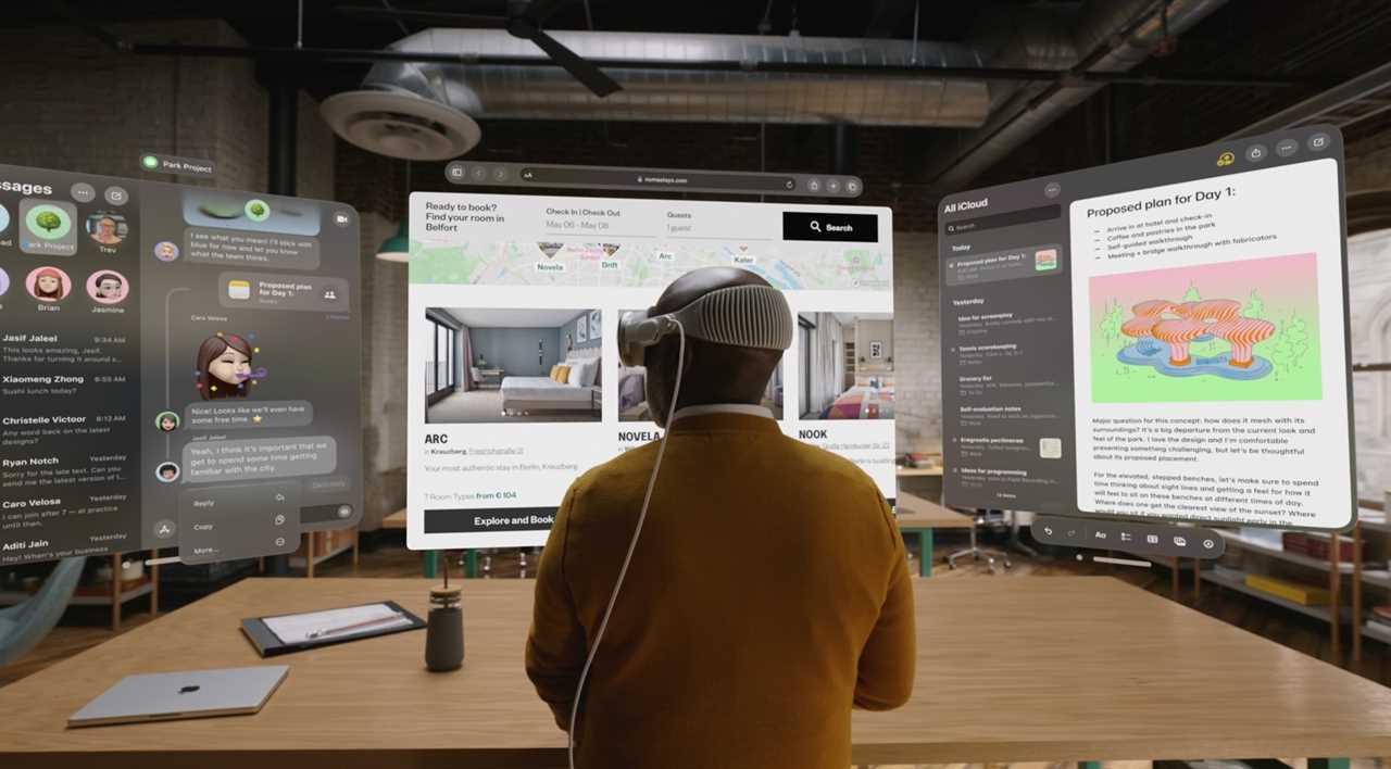 A Vision Pro user loading up multiple apps.