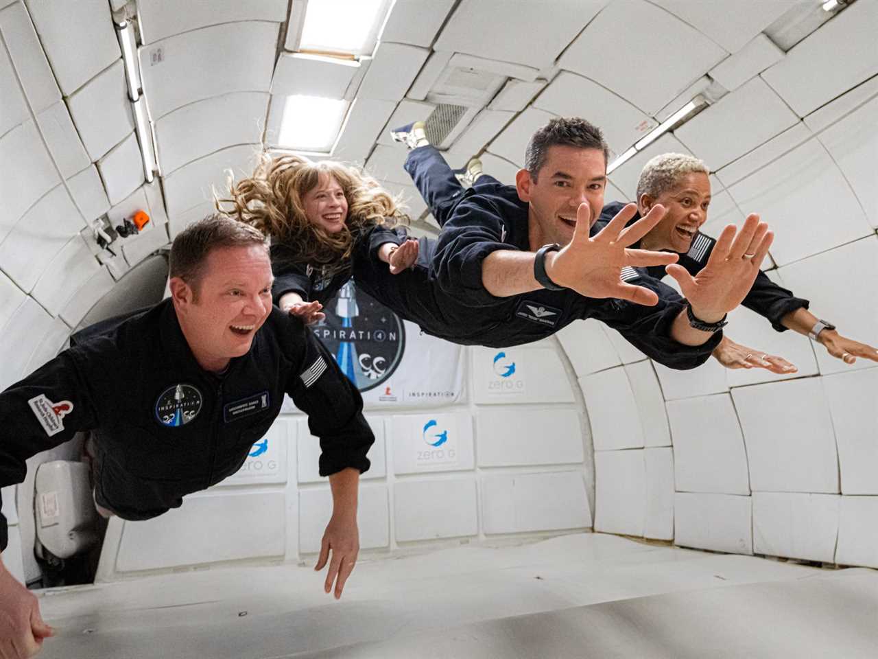 inspiration4 crew members screaming joy floating weightless inside plane