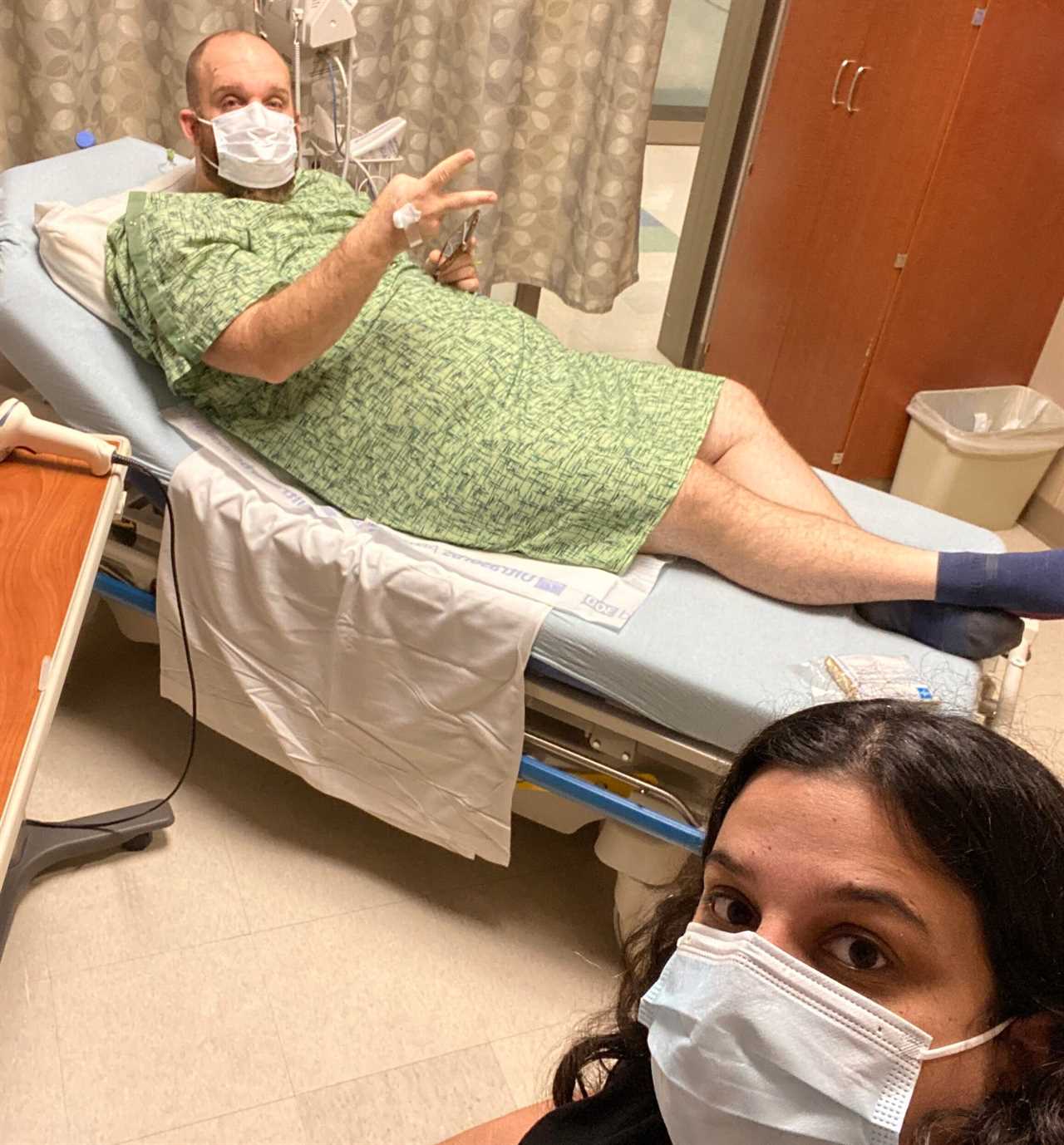 Lauren Savoie and her husband in a hospital