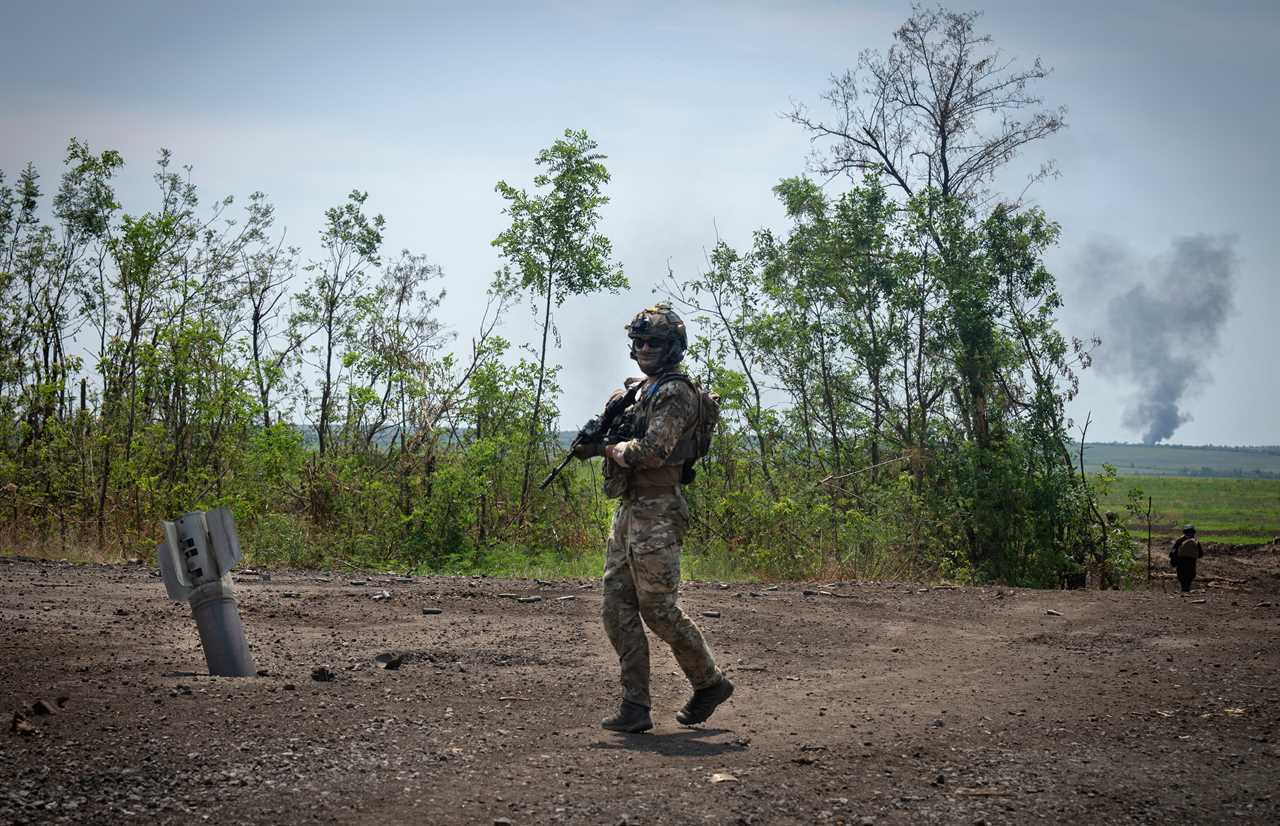 FILE - Ukrainian soldiers walk in their positions on the frontline in Zaporizhzhia region, Ukraine, Friday, June 23, 2023.