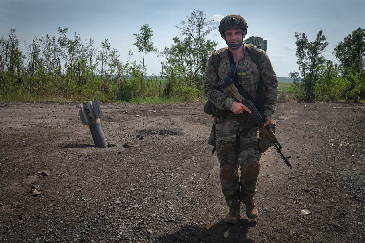 A Ukrainian soldier walk in his position on the frontline in Zaporizhzhia region, Ukraine, Friday, June 23, 2023.