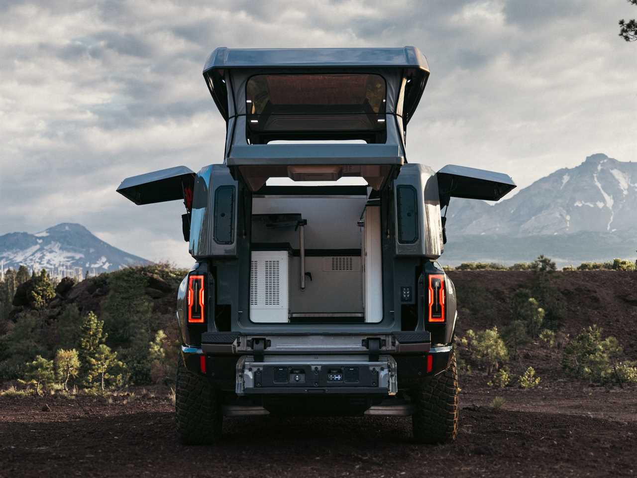 The rear of a GMC Hummer EV with EarthCruiser's upfit