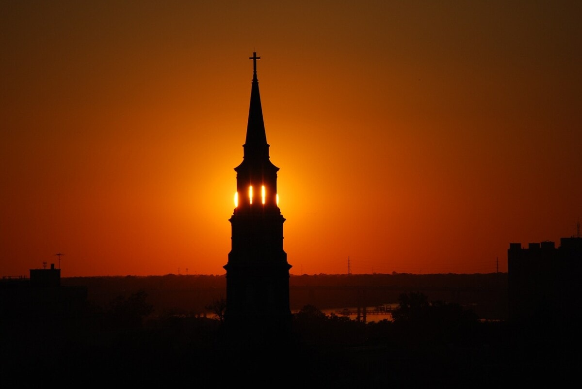 A church steeple at sunset