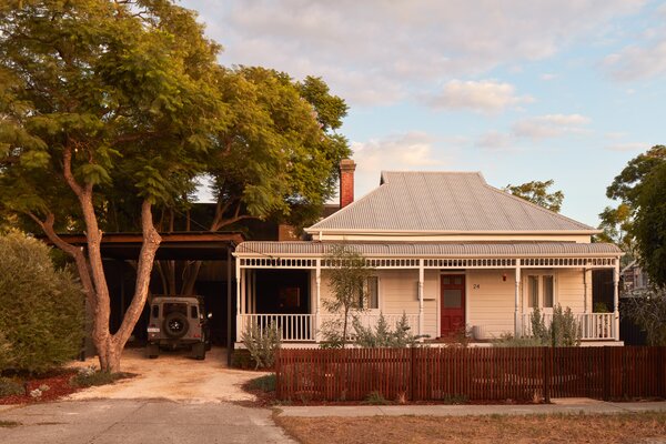 Dark Timber Cladding Hides a Soaring Extension at the Rear of This Australian Cottage