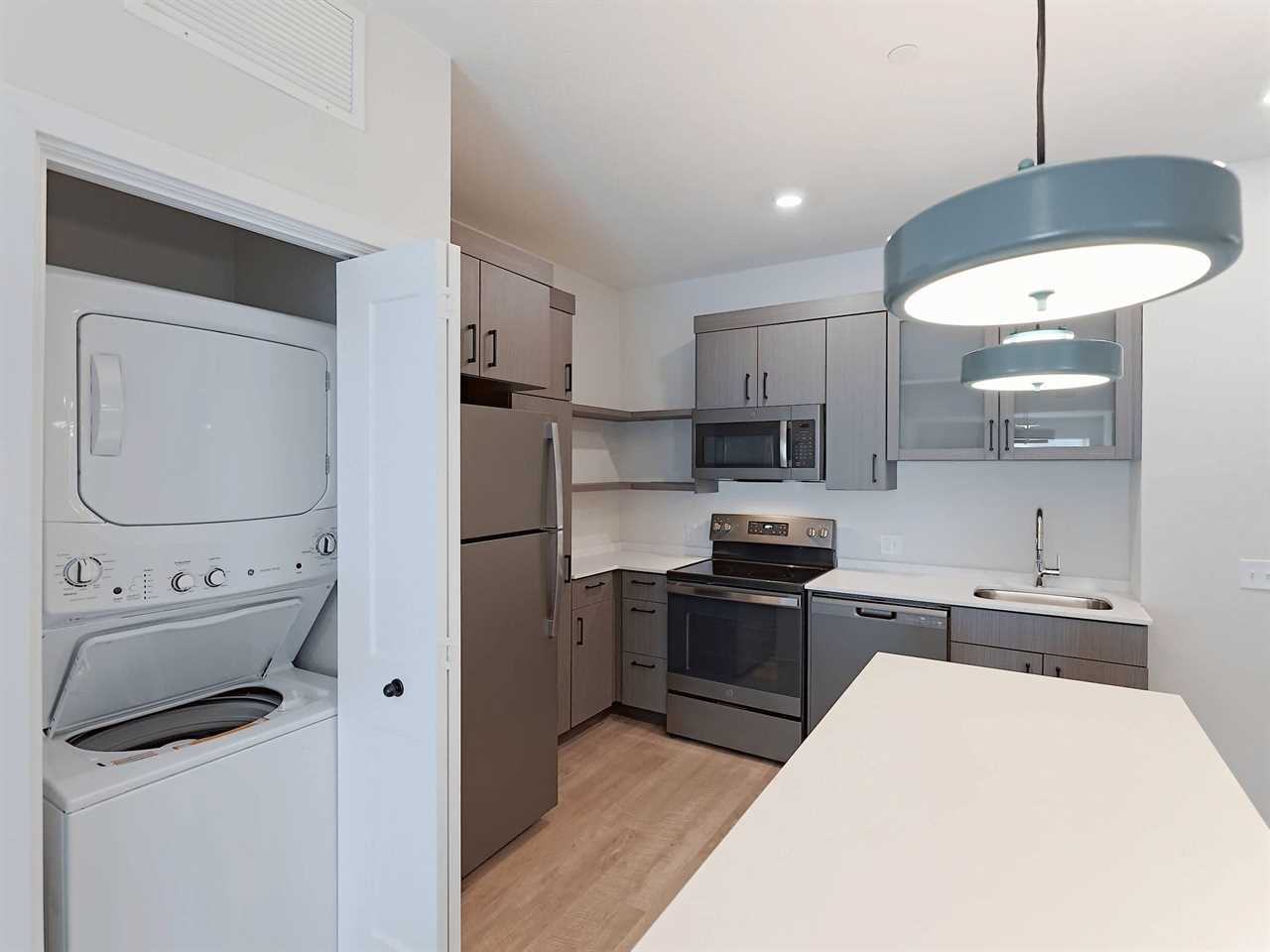 The kitchen of a WaterWalk hotel room.