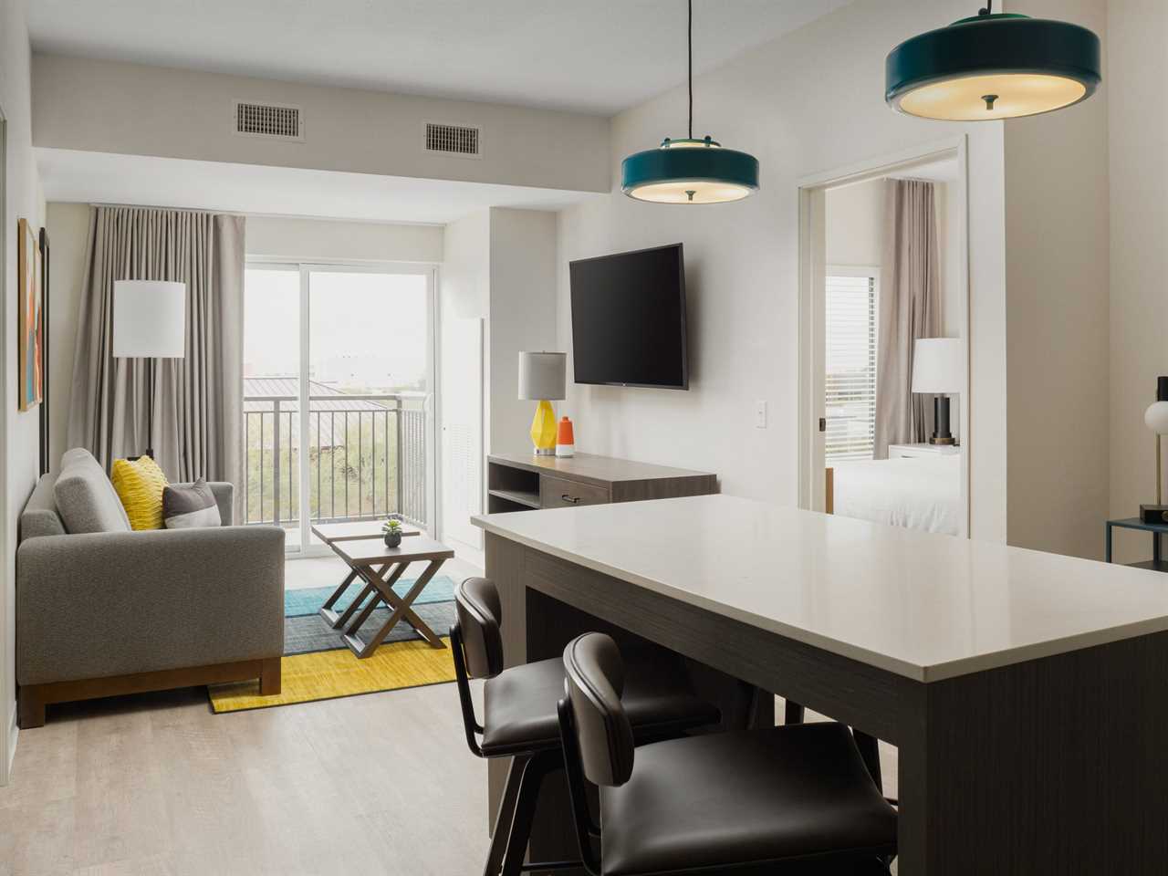 The living room of a two-bedroom WaterWalk hotel room.