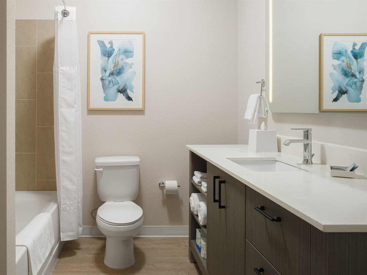 The bathroom of a two-bedroom WaterWalk hotel room.