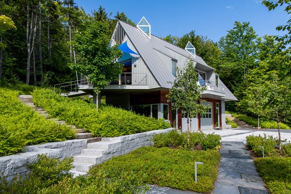 Designed and built a few years before the main house, the carriage house served as a prototype for the latter. The homeowners lived in this building while their residence was under construction. 