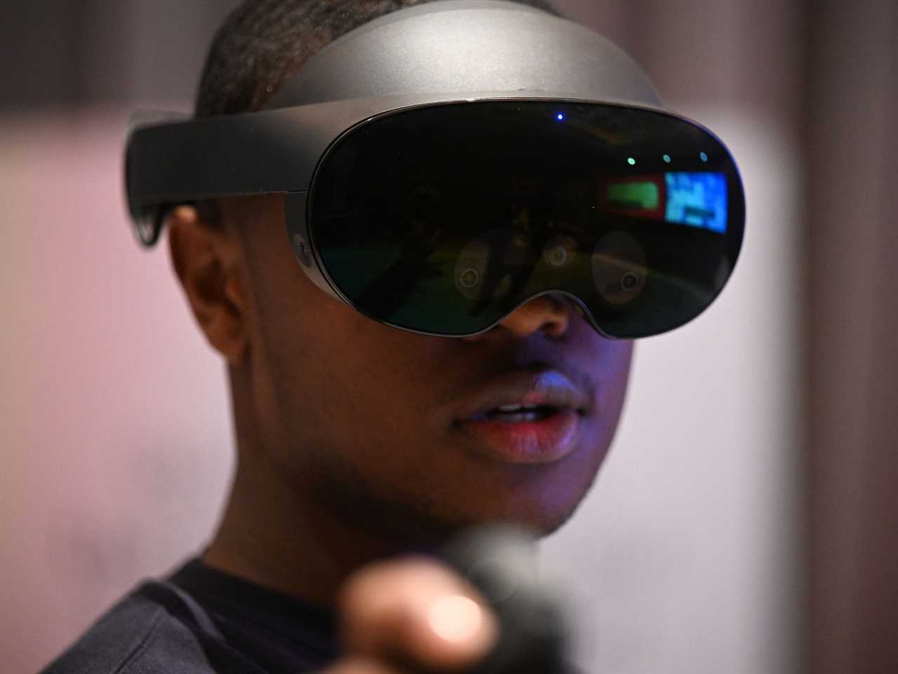 A man wears the Meta Quest Pro VR Headset