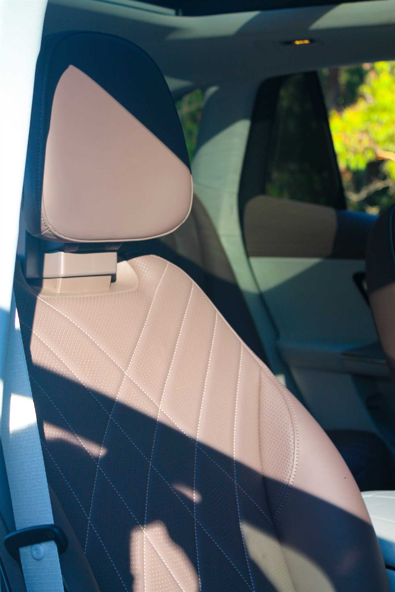 The brown leather interior of the Mercedes-Benz EQE electric SUV. 