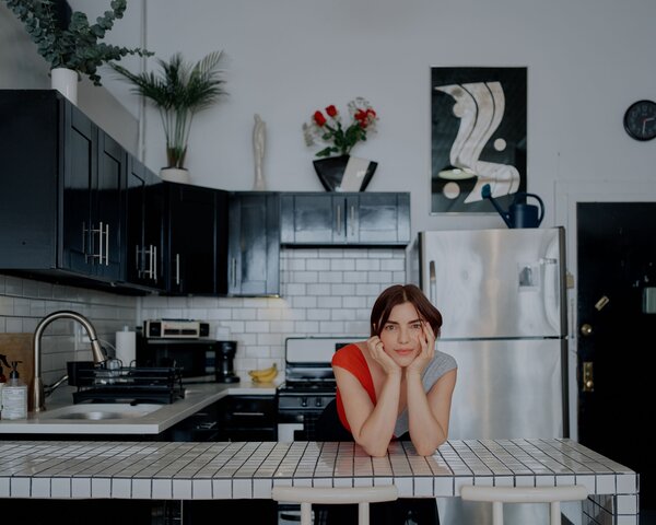 The countertop in Trimbur’s kitchen is custom-made to fit her aesthetic.