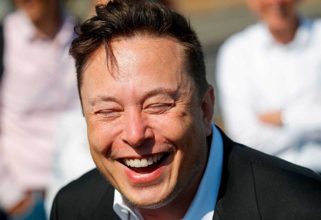 Elon Musk laughing