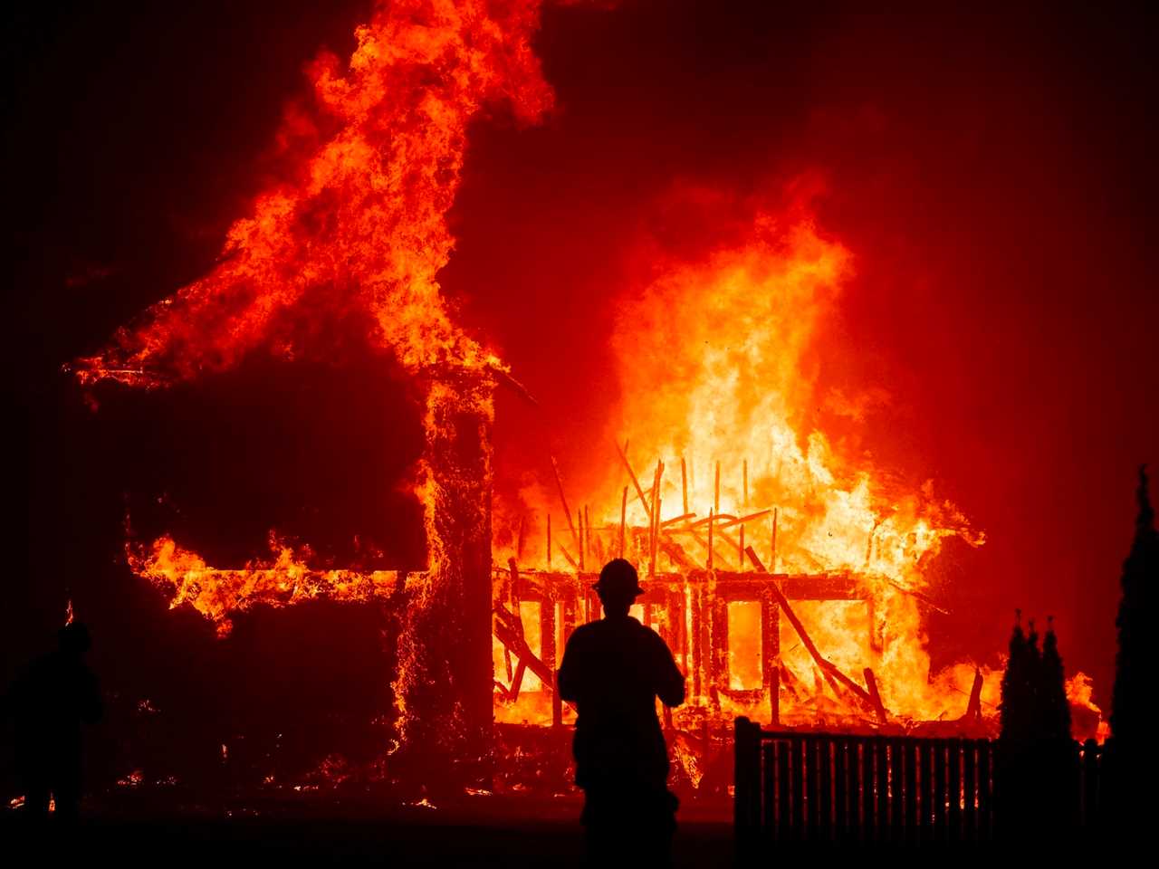 firefighter fighting a large fire