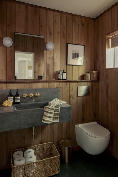 The crown jewel of the down stairs bathroom is a custom basalt stone sink sourced from Etsy seller AegeanMarble. Alta Projects was inspired by the stone that’s seen throughout Yosemite National Park, most notably in El Capitan.