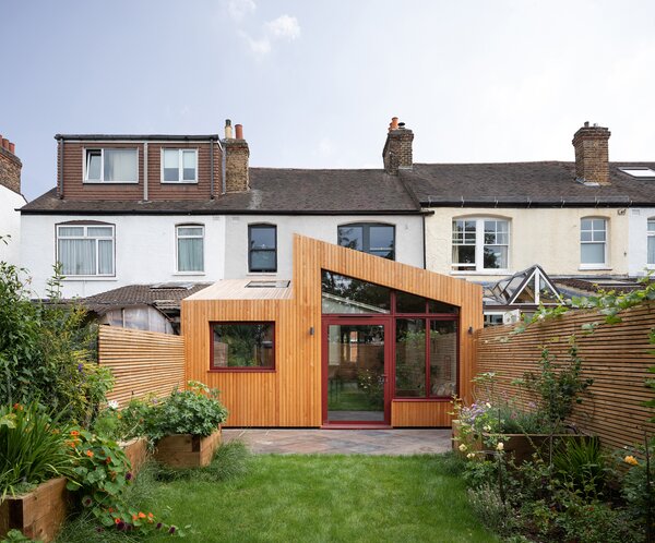 The extension’s exterior walls and roof is wrapped in Scottish larch cladding. 